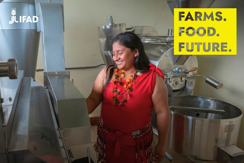 smiling woman in industrial kitchen