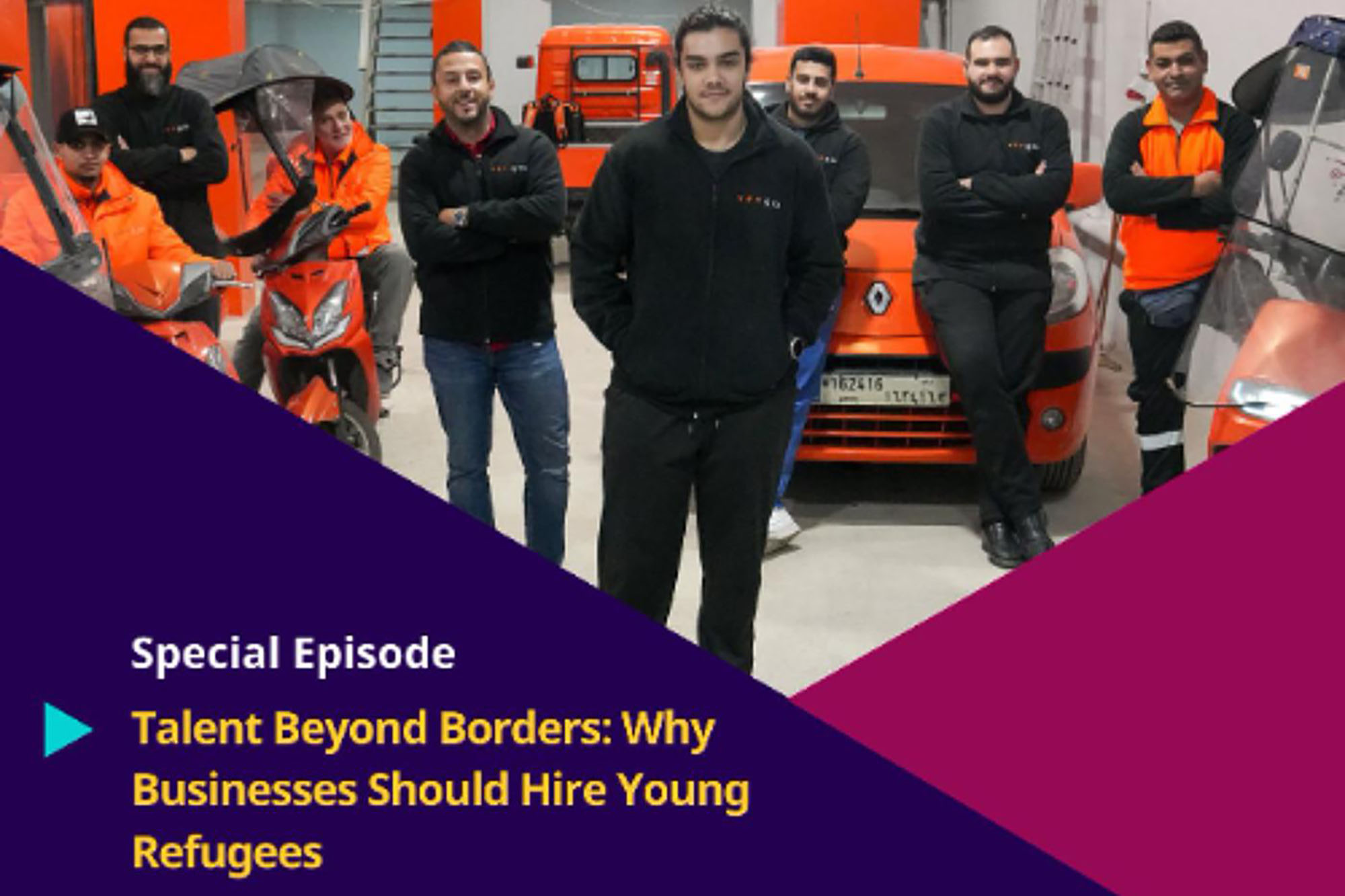group of young men in a car repair shop