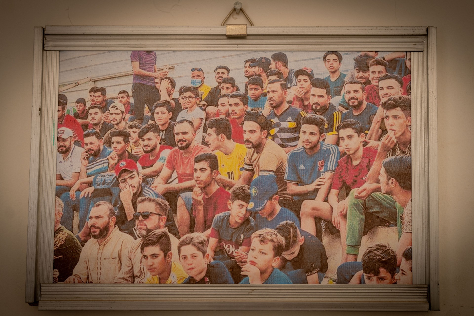 A portrait of young men at a local match.