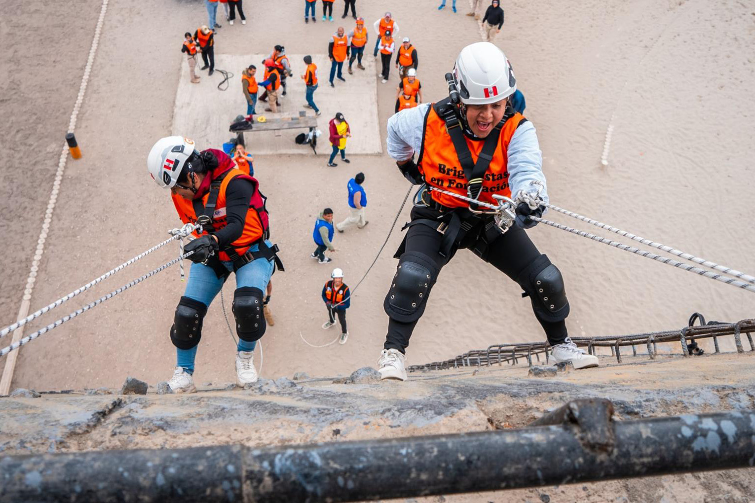 Tamara demonstrating rock climbing.