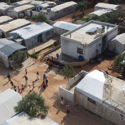 The Sultan internally displaced persons (IDP) camp near Kelly village in Idlib, north-west Syria, April 2024. The camp hosts some 200 families who have been displaced from the southern Idlib countryside for almost five years. UNOCHA/Mohanad Zayat The Sultan internally displaced persons (IDP) camp near Kelly village in Idlib, north-west Syria, April 2024. The camp hosts some 200 families who have been displaced from the southern Idlib countryside for almost five years. UNOCHA/Mohanad Zayat