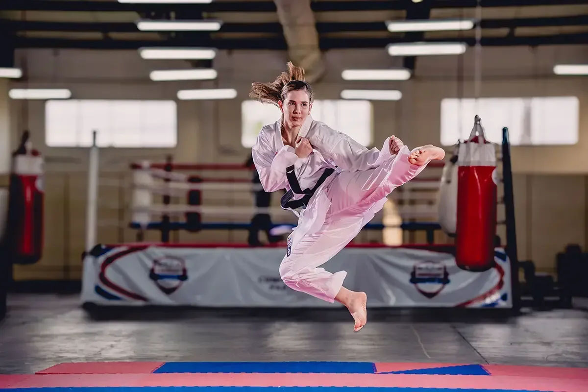 young woman practicing karate