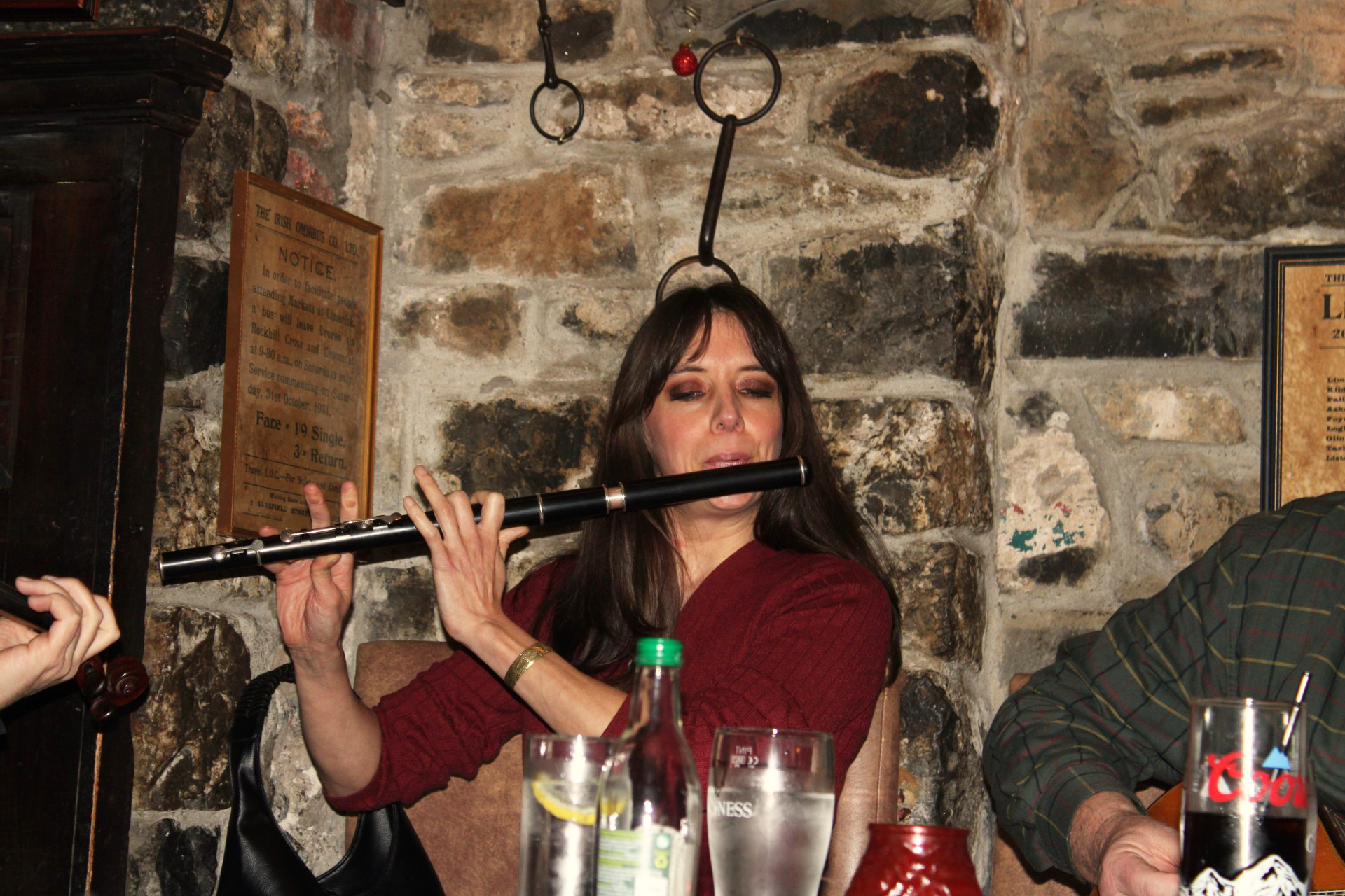 Clara playing a flute.